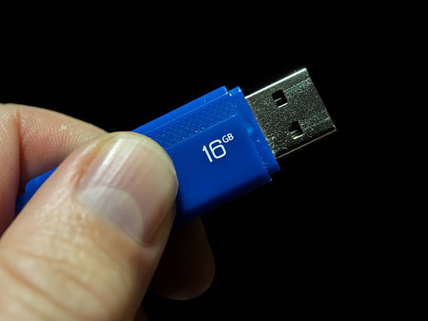 16GB Blue USB Flash Drive in Hand
