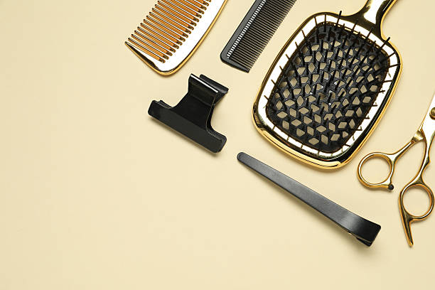 istock Hairdressing tools on beige background, flat lay. Space for text 2242902667