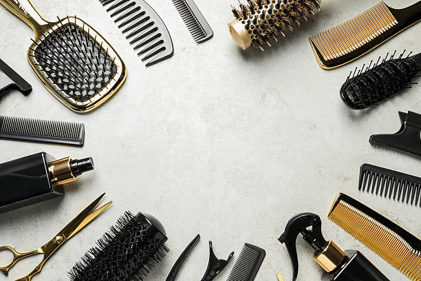 istock Frame of hairdressing tools on light background, flat lay. Space for text 2242902689