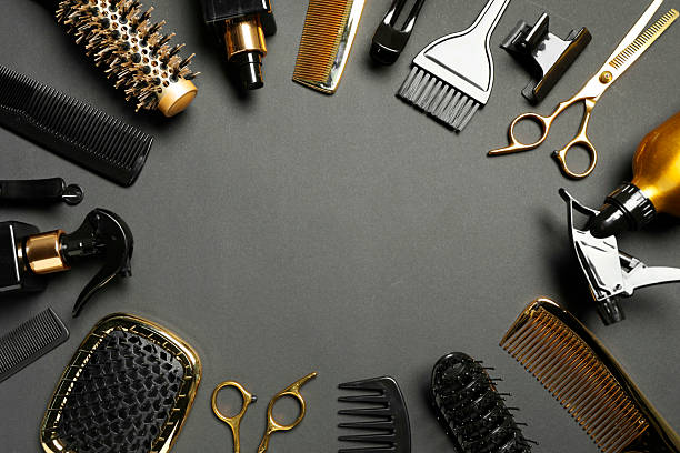 istock Frame of hairdressing tools on dark background, flat lay. Space for text 2242902690