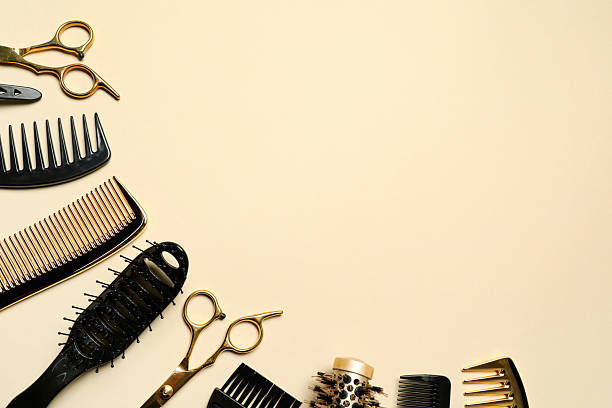 istock Hairdressing tools on beige background, flat lay. Space for text 2242902709