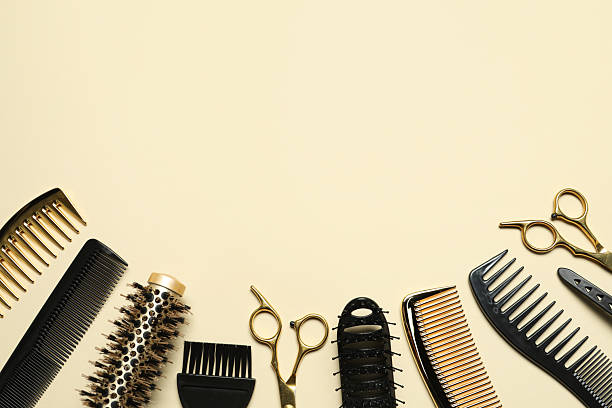 istock Hairdressing tools on beige background, flat lay. Space for text 2242902724
