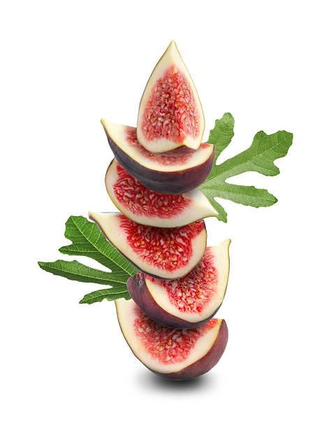 istock Stacked fresh figs and green leaves on white background 2242904093