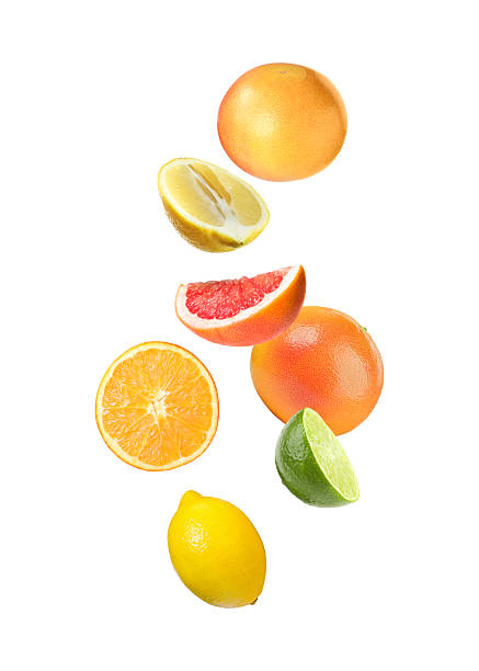 istock Many different fresh citrus fruits falling on white background 2242904104