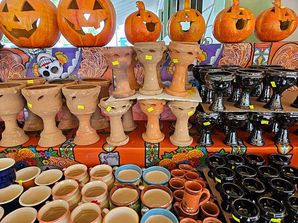 istock Ceramic handmade cups on a market display in Mexico 2242905254