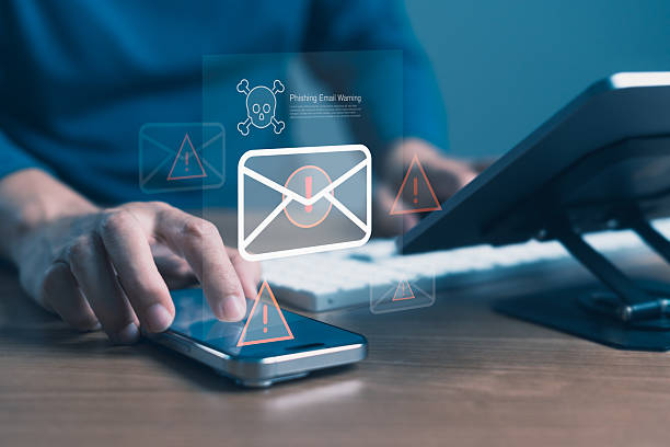 istock Phishing scam email warning on smartphone screen with alert icons, representing cyber threat, data theft, email fraud, and mobile communication security risk 2242905711