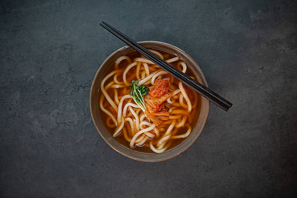 istock Delicious Udon Noodle Soup with Kimchi and Chopsticks 2242907085