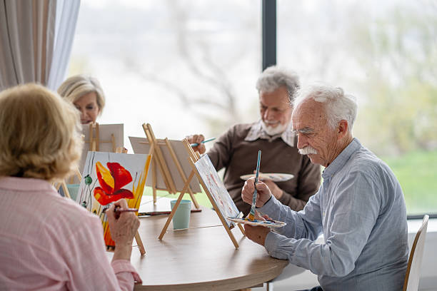 istock Seniors focused on painting as a creative outlet 2242911359