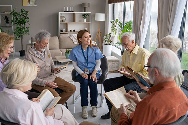 istock Seniors Sharing Books During Engaging Discussion 2242911578