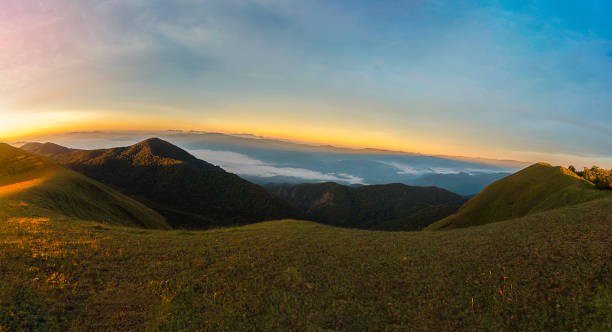 istock Mountain landscape at sunset. forest and green slopes 2242916884