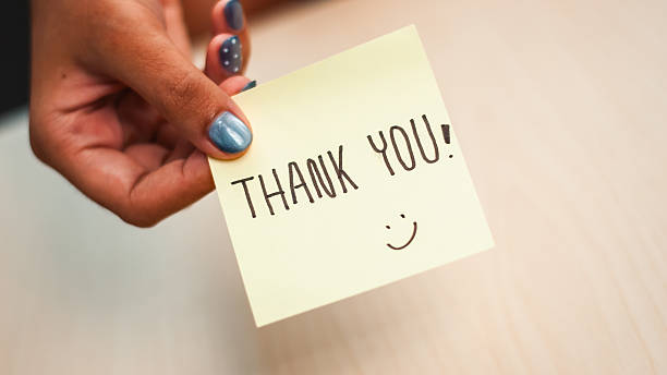 istock Expressing gratitude handwritten thank you note personal touch indoor setting close-up view 2242930161