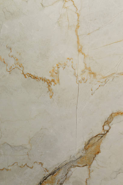istock Beautiful marble surface with unique veins and textures in warm earthy tones, perfect for interior design projects or home decor 2242933172