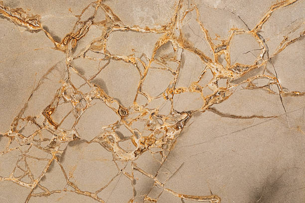 istock Natural stone surface with intricate veins and patterns showcasing a unique blend of colors and textures for interior design 2242933201