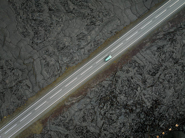 Road stretching through volcano lava, Iceland