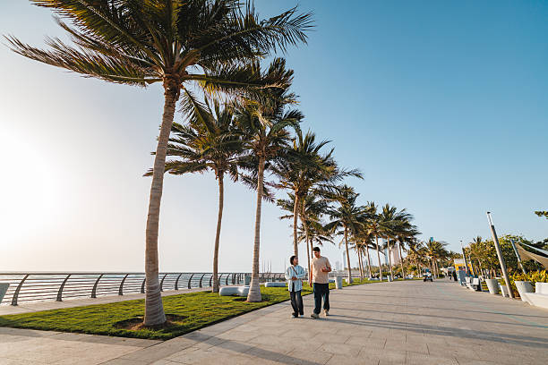 istock Joyful Diverse Young Couple Enjoying Jeddah Corniche Stroll 2242939200