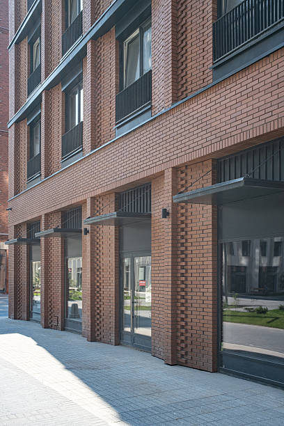 istock Facade of a Modern Brick Residential Building 2242942524
