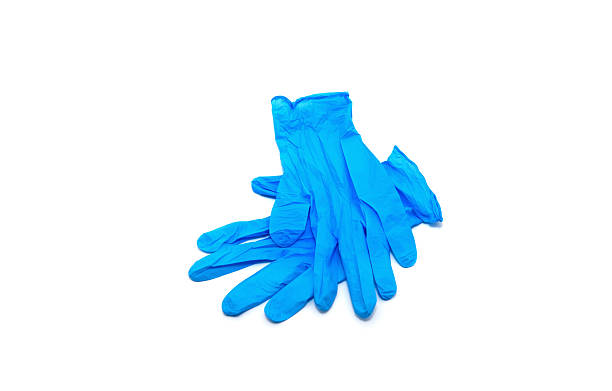 istock Blue medical gloves on white background 2242961518