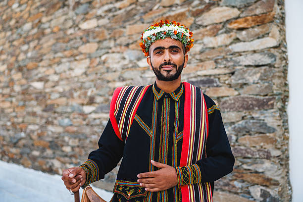 Long-sleeved red velvet xhamadan, traditional wool vest-jacket worn by men usually richly embroidered in gold revealing, in the past, social rank. Market stall, Pazari i Ri-New Bazaar. Tirana-Albania.