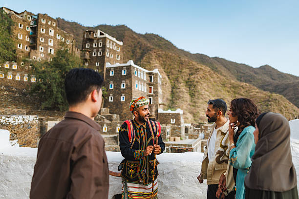 istock Joyful Saudi Guide Sharing Stories with Captivated Visitors 2242961715