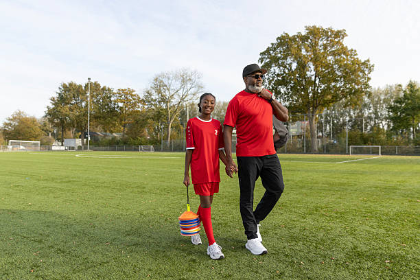 istock Father and daughter at soccer training 2242969542