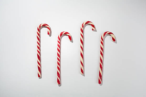 istock Minimal composition with christmas lollipops on color background, top view 2242972530