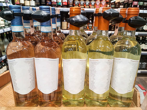 istock Close-up on bottles of wine displayed at store 2242974875