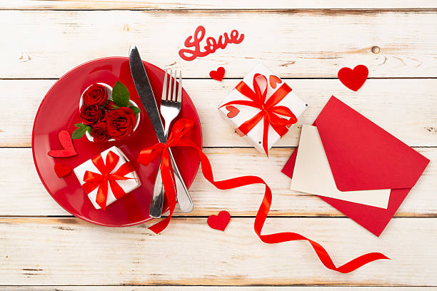 istock Festive table setting for Valentine's Day on wooden background, top view 2242975618