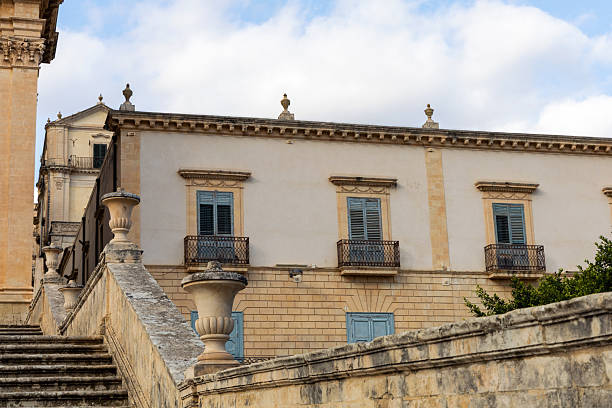 istock Historic Italian building with balcony and shutters 2242980070