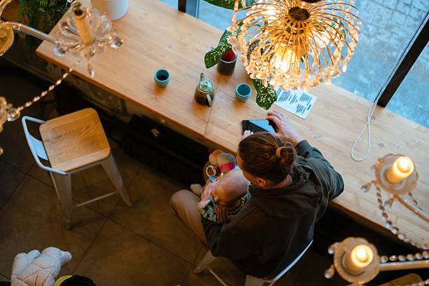 istock Father with toddler spending time together in cafe 2242983026