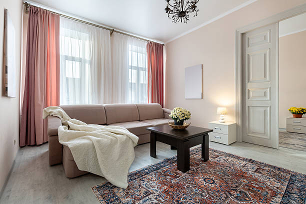 istock Bright Cozy Living Room with Elegant Decor and Soft Lighting 2242984366