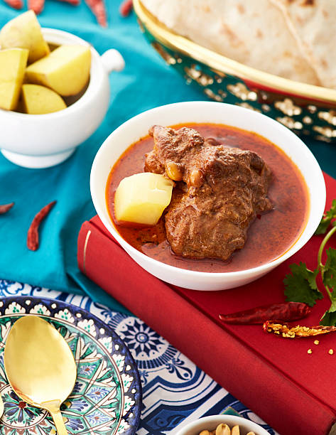 istock Traditional Thai Beef Massaman Curry with Potatoes and Roti Bread  Authentic Thai Cuisine 2242993505
