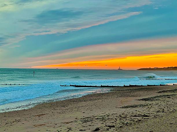 istock Sunrise coloured cloudscape at Blyth in Northumberland 2242998059