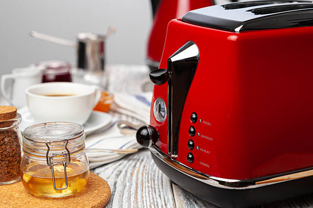 istock Close up of red kitchen .appliances on kitchen table 2242998816