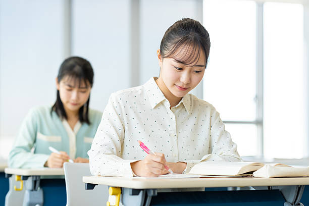 istock Female college student attending a lecture 2243000590
