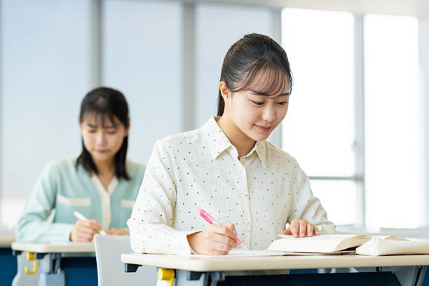 istock Female college student attending a lecture 2243000594