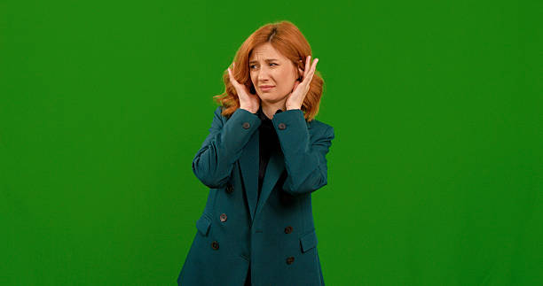 istock Woman expressing discomfort with gestures in a studio setting 2243000827
