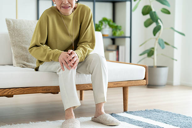 istock Senior woman with sore legs 2243001648