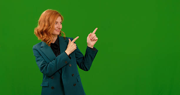 istock Woman showcasing various gestures in a studio during a green screen session 2243003539