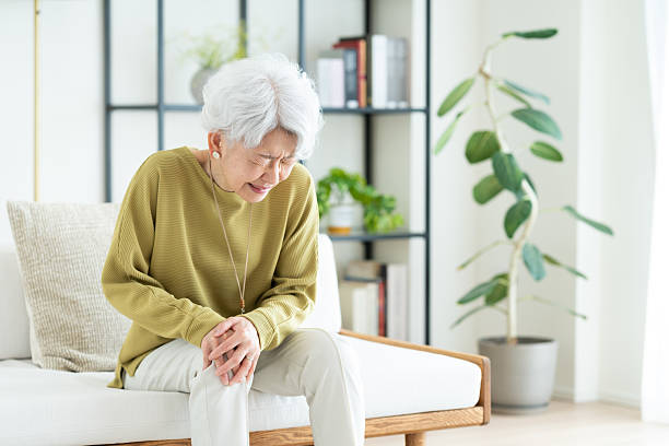 istock Senior woman with sore legs 2243004083
