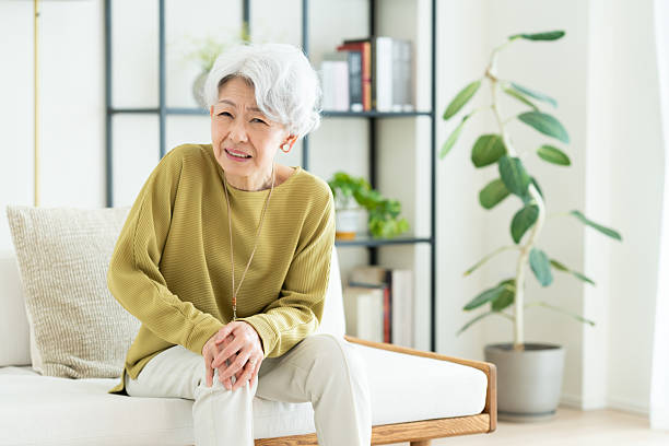 istock Senior woman with sore legs 2243004084
