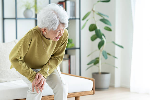 istock Senior woman with sore legs 2243004088
