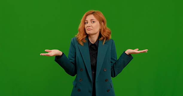 istock Woman displaying various gestures with a green background 2243004109