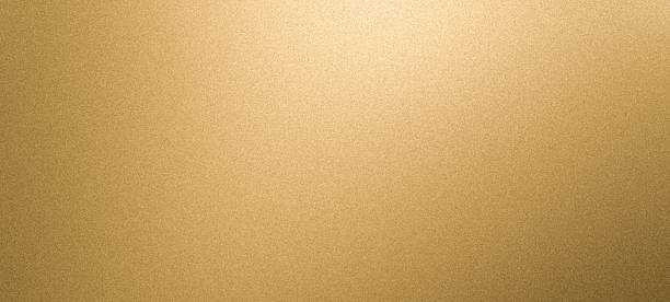 istock Grainy gold foil gradient golden bronze color matte noisy blurred luxury plain background banner 2243009568