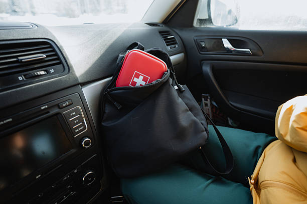 istock Experience a cozy car interior, complete with a wellstocked first aid kit and a warm, comfortable jacket, all prepared and ready for your exciting winter adventures ahead 2243011003