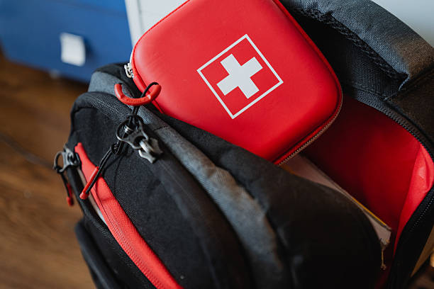 istock This is a Compact Emergency First Aid Kit designed to fit conveniently in a Backpack, making it perfect for ensuring safety during Outdoor Adventures and Travel 2243011033