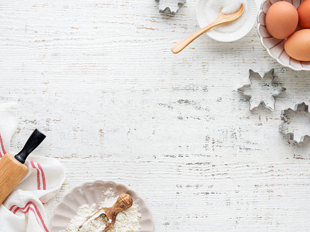 istock Culinary background with Ingredients for cooking Christmas baking on old white wooden background table. Top view. Christmas holiday kitchen background. Design element. 2243012928