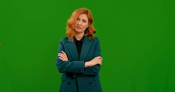 istock Woman disgusted saying What over green screen background. 2243013776