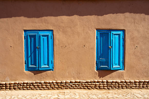 Taos, New Mexico / USA – November 6, 2011: Adobe structures have been built for centuries in the Southwest United States.