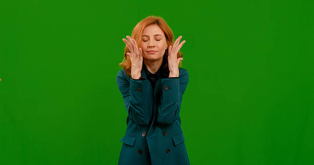 istock Stressed angry woman screaming at chromakey background looking at camera. 2243016321