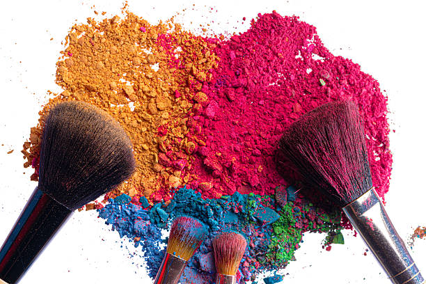 istock Broken scattered mix of eye shadows with make-up brush 2243016385
